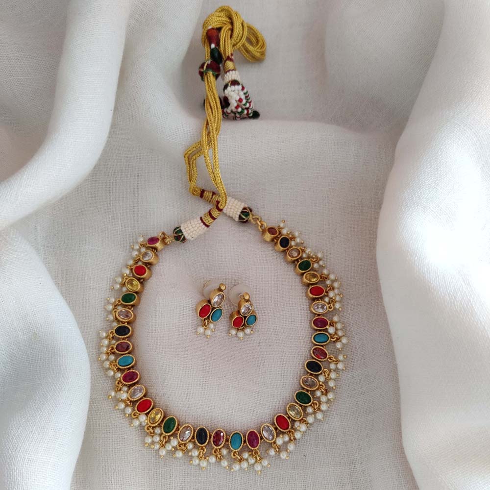 Stunning one gram gold necklace studded with multi color stones. latest one  gram gold jewellery one