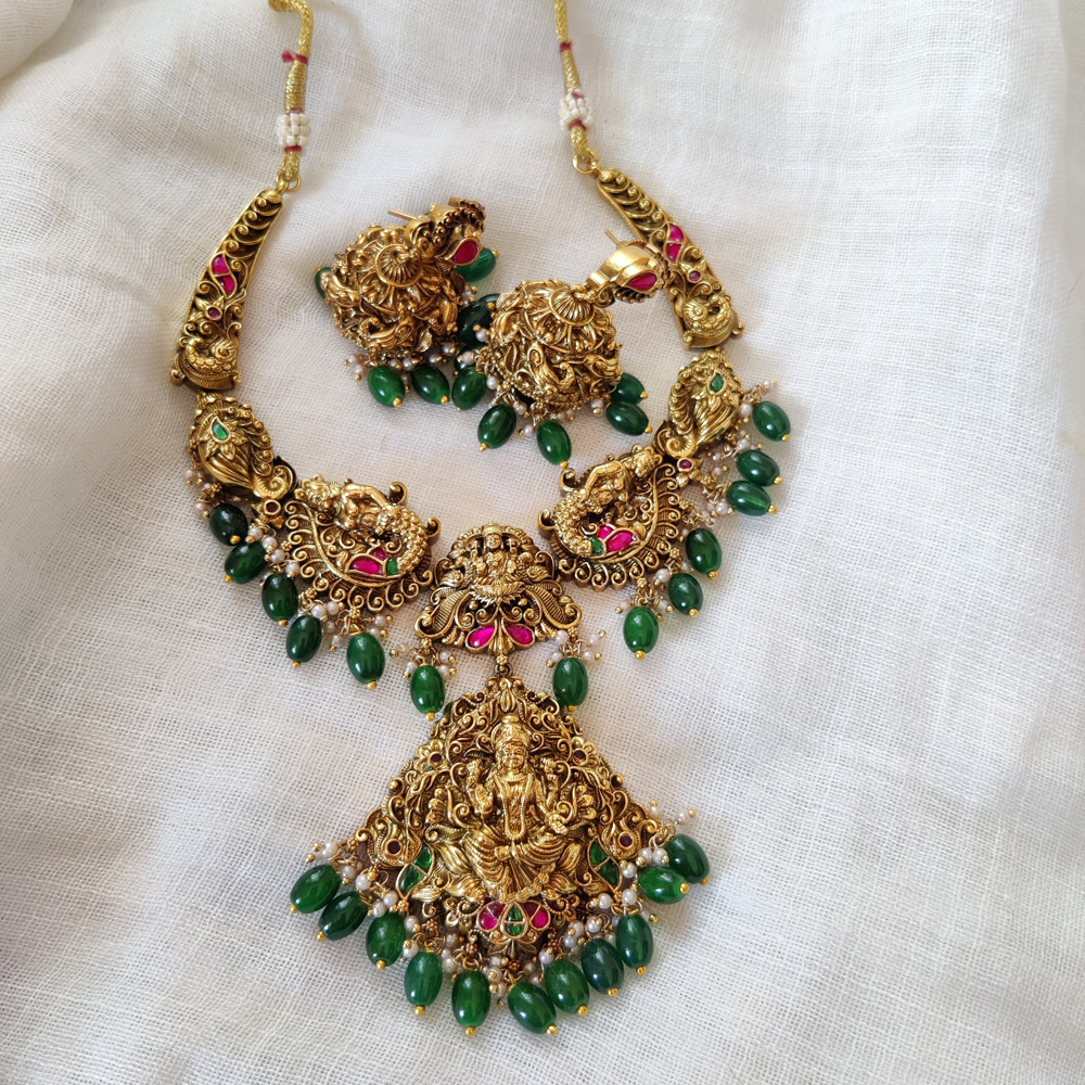 Antique Gold Peacock Nakshi Kundan Necklace With Green Drops